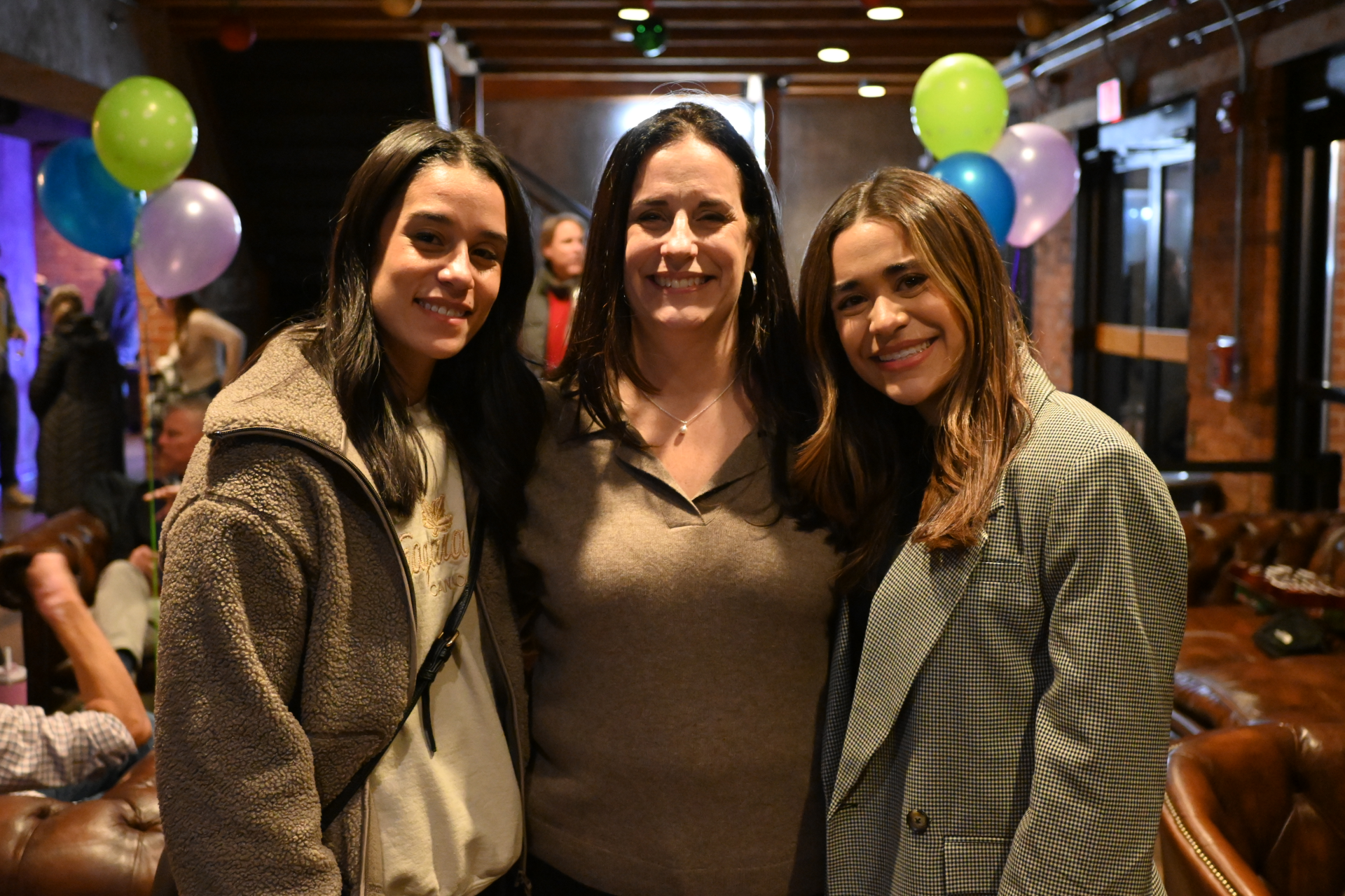 Maria celebrates with her daughters